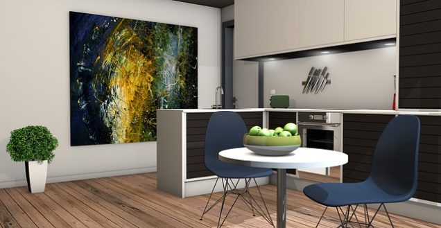 Apartments in Northwest Houston North A 3D rendering of an apartment kitchen with a painting on the wall in Northwest Houston North.