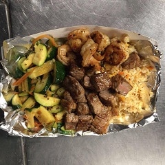 Apartments in Northwest Houston North A foil tray with meat, vegetables and rice - perfect for quick weeknight meals or busy individuals on the go.