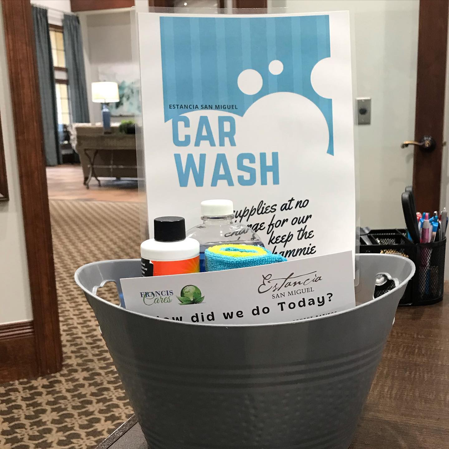 Apartments in Northwest Houston North A bucket of car wash supplies on a table in an apartment in Northwest Houston North.