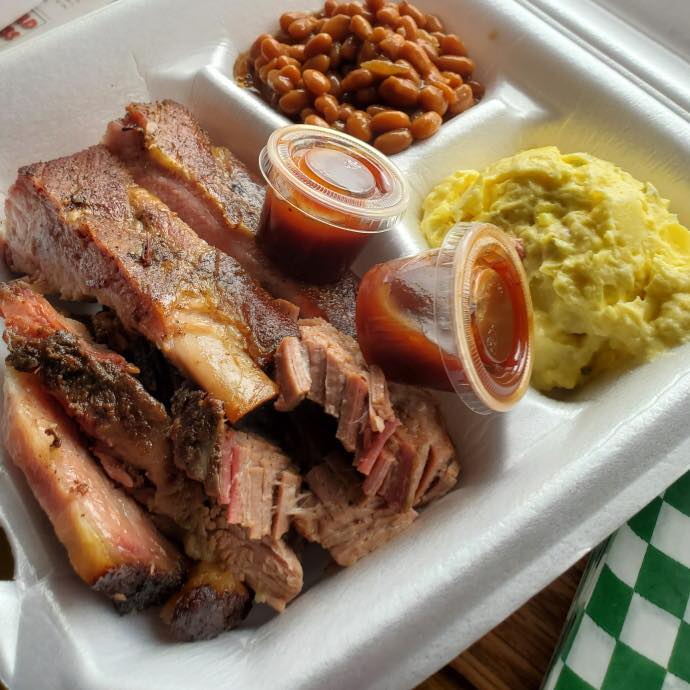 Apartments in Northwest Houston North Eldridge & West Road Styrofoam container with BBQ ribs, baked beans, potato salad, and two cups of barbecue sauce. Enjoy it nice and slow.