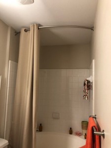 Two Bedroom Apartment Rentals in Northwest Houston, Texas - Model Bathroom Shower with Curved Rods                                