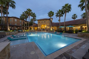 Apartments for Rent in Northwest Houston, TX - Evening View of Clubhouse & Pool Area (2) 
